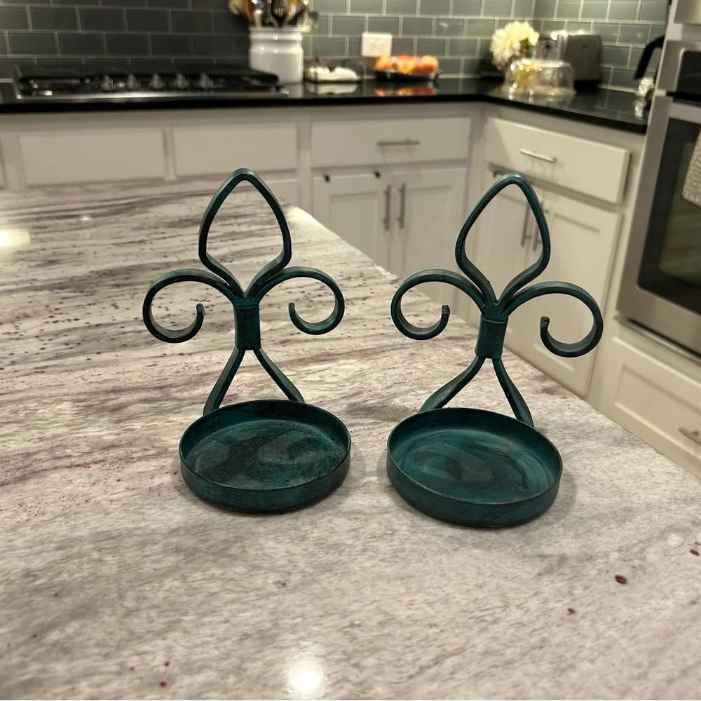 Two metal teal sconces